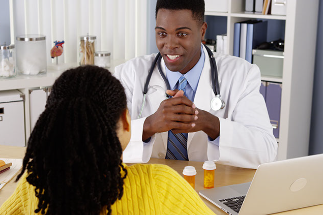 Image of doctor and patient talking.