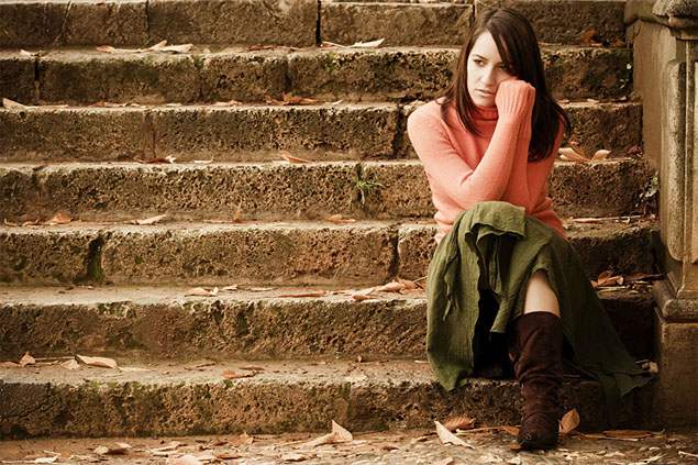 Image of women sitting on stairs.