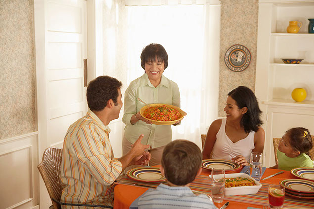 Image of family having dinner.