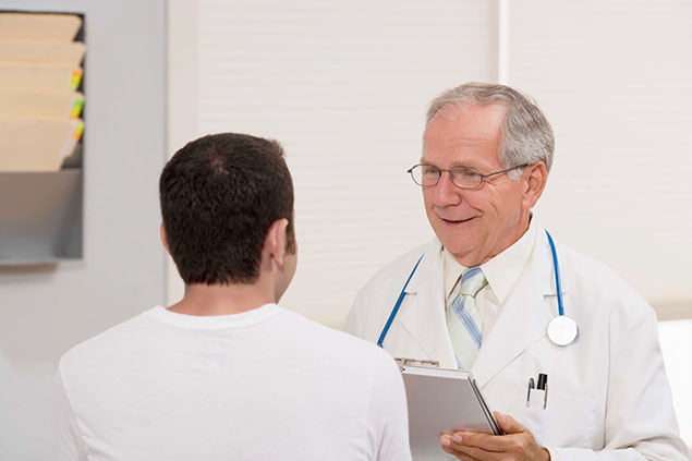 Image of doctor and patient talking.
