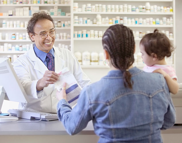 Image of mother and daughter at the pharmacy.