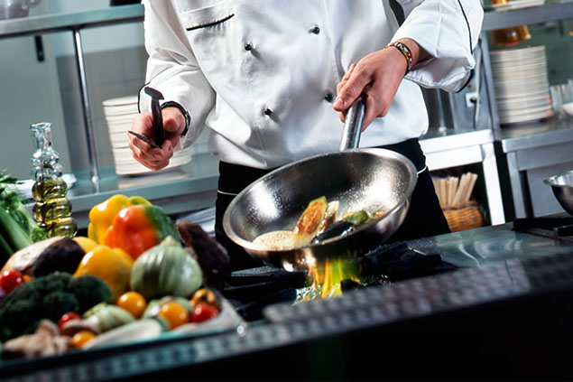 Image of chef cooking in the kitchen.