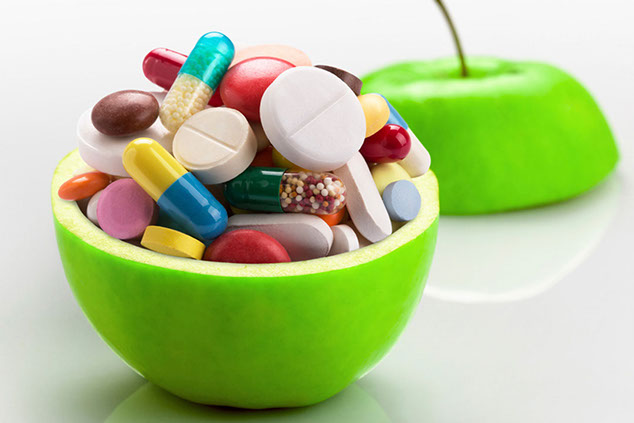 Image of a variety of vitamins in pill form.