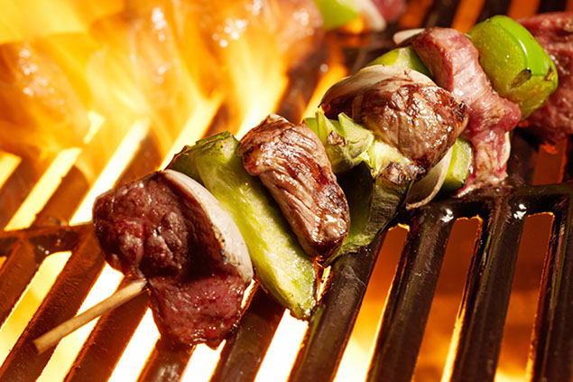 Image of meat being grilled.