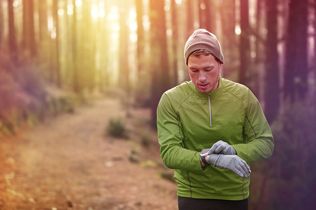Image of man checking heart rate.