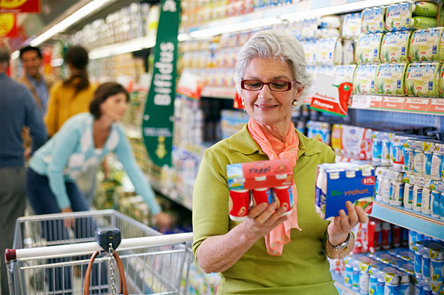 Image of older women at grocery store.
