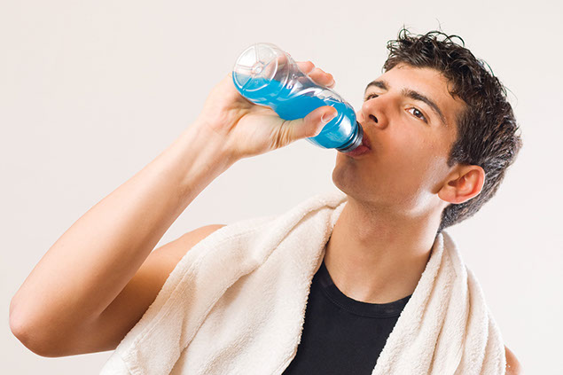 Image of man rehydrating with liquids.