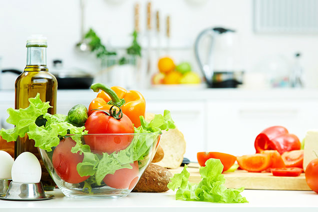 Healthy foods are on the table in the kitchen.