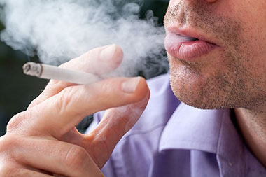 Image of cigarette and smoke.