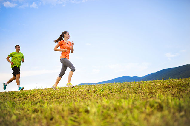 Image of couple running.