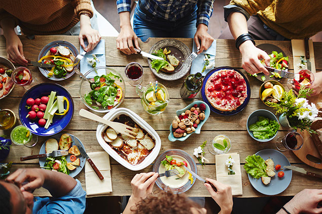 Top view of friends eating together.