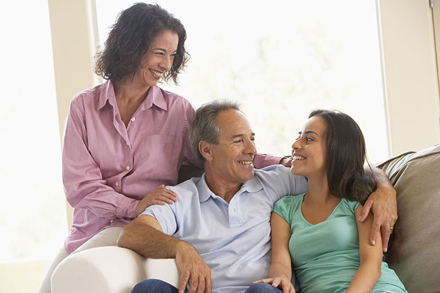 Image of sitting together laughing.